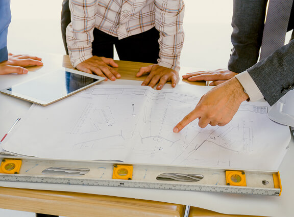 people looking at a plan